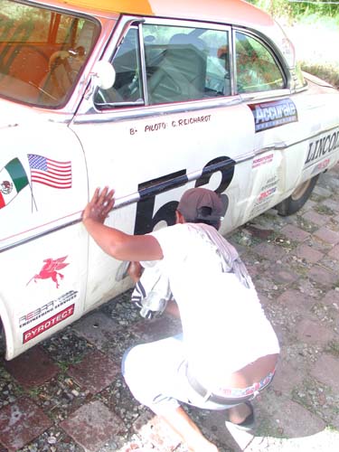 guy cleaning car
